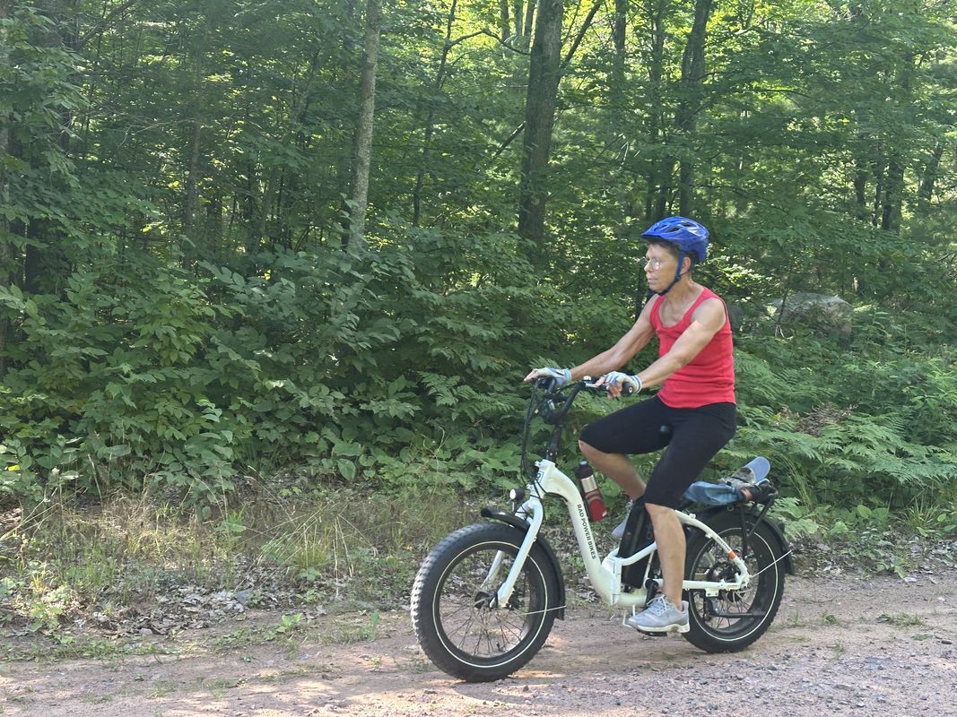 Robert and Patricia ride to Long Lake and to the campground and back Washburn